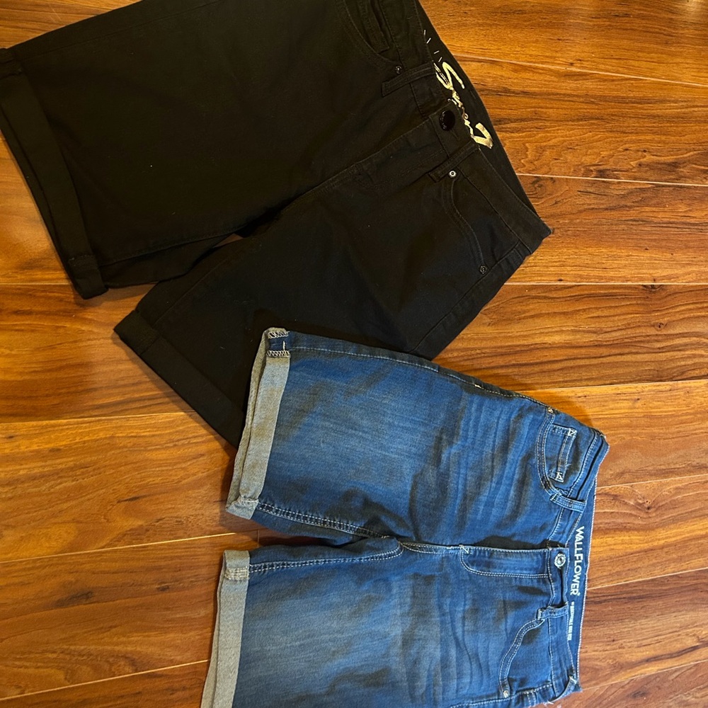 Two pairs of roll hem shorts.  One black, one blue.